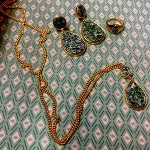 Necklace, earrings and ring.